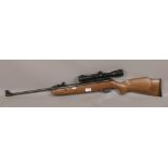 A SMK break barrel 177 calibre air rifle fitted with a Hawke sport HD 4 x 32 scope, complete with