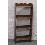 A carved oak open bookcase, 107cm x 46cm.