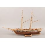 A wooden model of a French two mast sail ship La Touldnnaise.