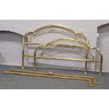 A brass designer double bed frame.