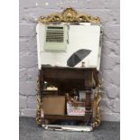 A gilt framed bevel edge wall mirror.