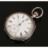 A silver pocket watch with Roman numeral markers, assayed Birmingham 1885.