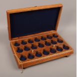 A pocket watch display case with two fitted trays.