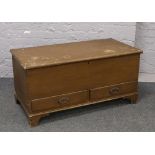 A Victorian scumble glazed pine mule chest having candle box and concealed drawers to the interior.