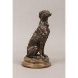 A reproduction bronze model of a seated hound, after F. Scochel Paris.