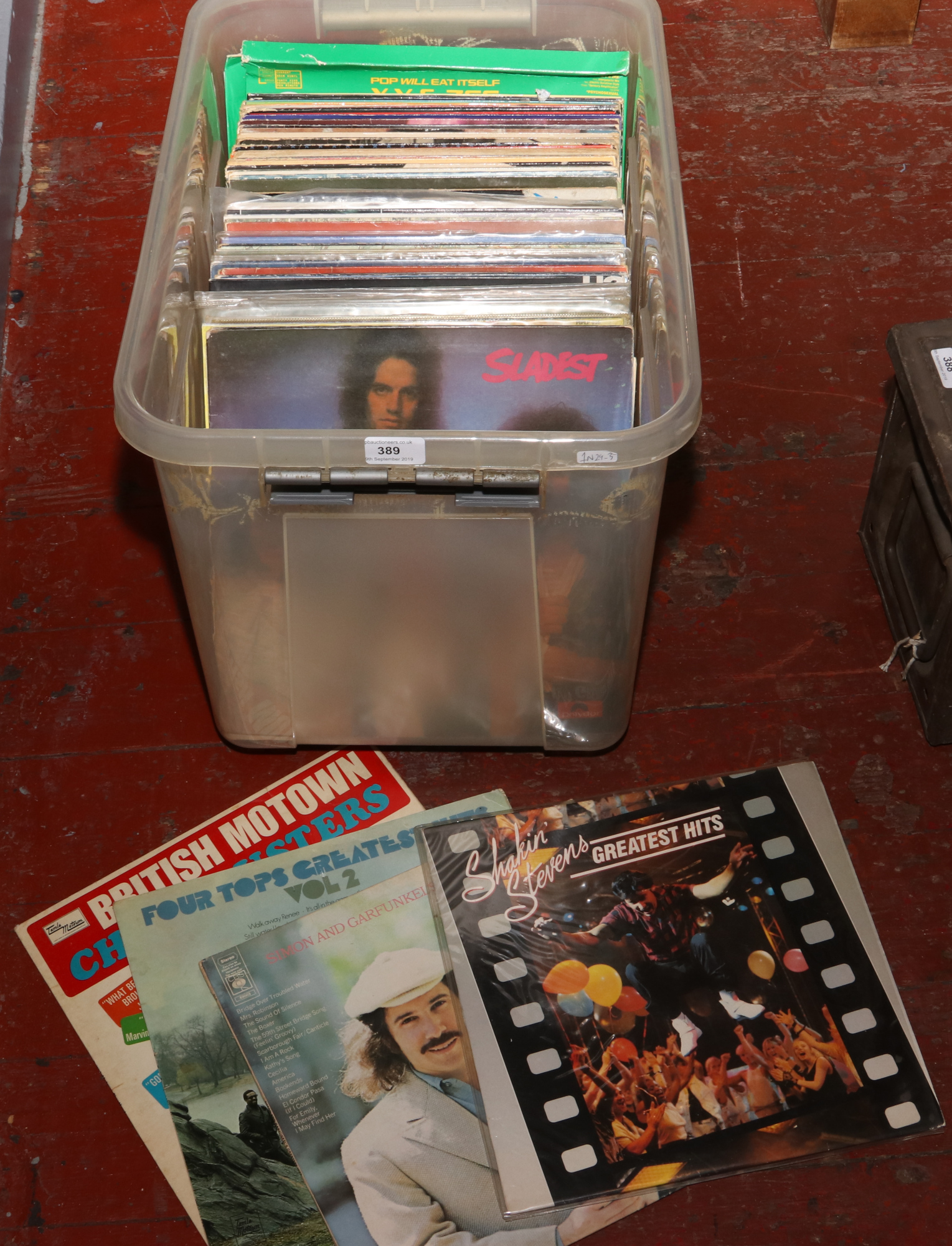 A box of L.P records mostly rock, pop and easy listening including Simon & Garfunkle, Shakin