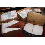 Three boxes and a suitcase to include furs, lace, linen, parasol etc.