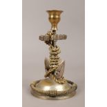 A gilded nautical themed candlestick, formed as a fowled anchor.