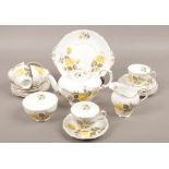 A Royal Standard bone china six place tea set in the Sunset design including six trios, sandwich