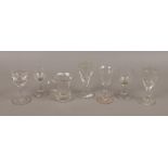 A group lot of antique drinking glasses to include Victorian penny lick examples etc.