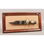 The American Eagle bowie knife by Ronald Van Ruyckevelt on presentation frame.