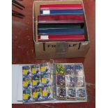 Seven folders of football collectors cards.