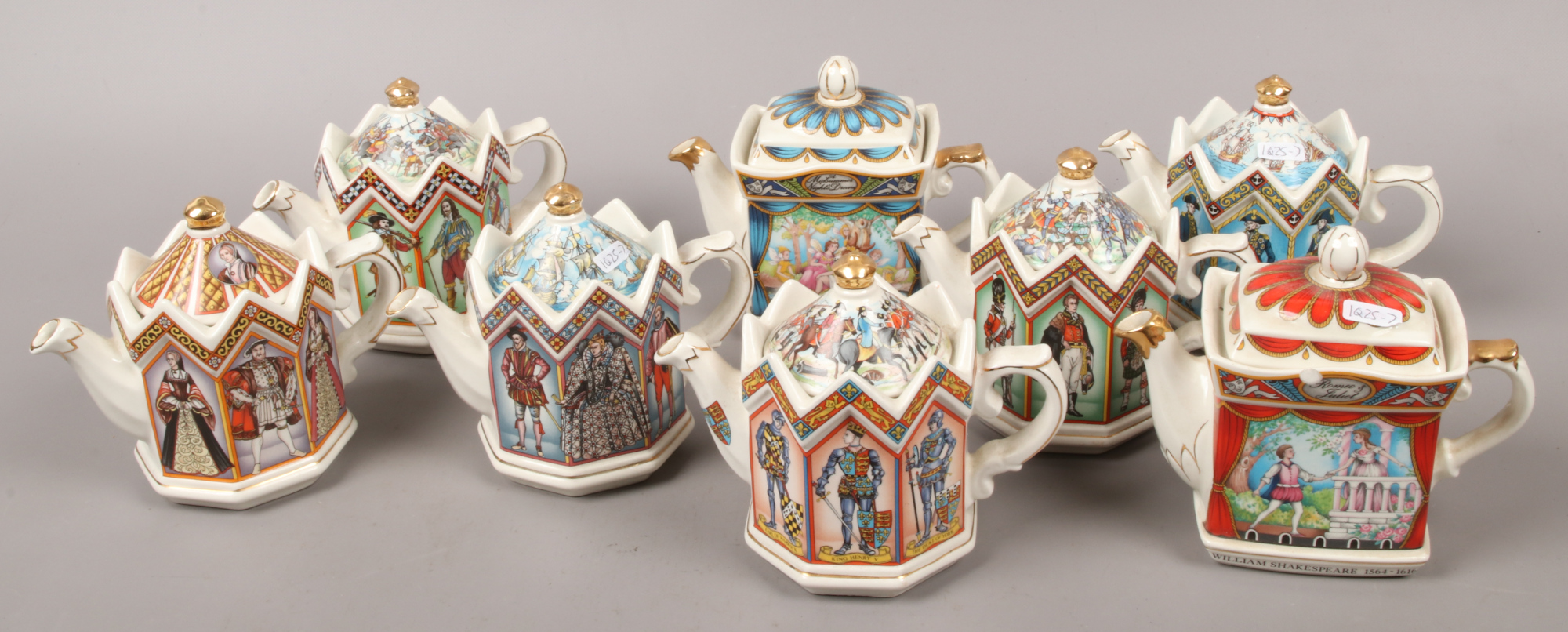 Eight ornamental Sadler ceramic tea pots.