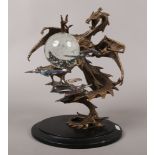 A Franklin Mint hot cast bronze model of a dragon, entitled The Dragon of Power - Crystal ball by