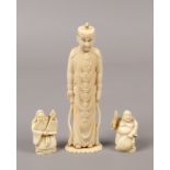 A 19th century Indian carved ivory figure and two netsukes.