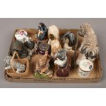 A box of composite models of Lhasa Apso dogs, along with a composite cottage, Aynsley Wild Tudor
