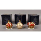 Three Royal Crown Derby paperweights, two Crowns for Queen Elizabeth II Golden Jubilee, 100th