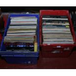 Two boxes of L.P records mainly classical along with music guide and opera books.