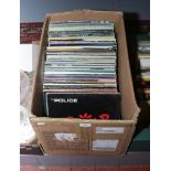 A box of 1970s L.P records to include The Police, Elvis, Rod Stewart etc.