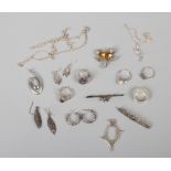 A quantity of silver jewellery including Celtic thistle brooch, hardstone set rings, necklaces etc.