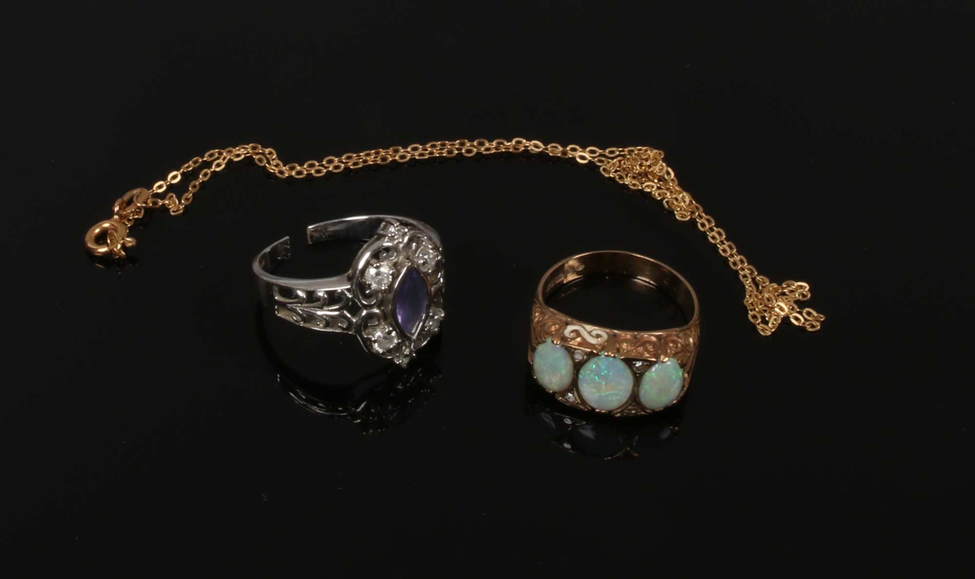 Three pieces of scrap 9ct gold; chain, opal ring and white gold, gem and diamond ring, gross