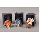 Three Royal Crown Derby squirrel paperweights to include limited edition Welbeck squirrel, all