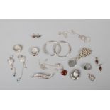 A quantity of silver jewellery including amber set earrings, bracelet, stone set rings etc.