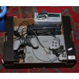 Two retro gaming consoles including original Playstation one with controllers and power leads, along