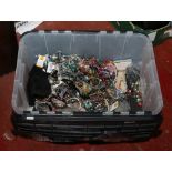 A large box of costume jewellery to include necklaces, beads, bangles etc.