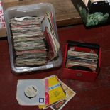 A box and carry case of single records to include Frank Sinatra, Elvis, Status Quo etc.