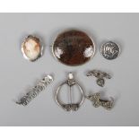 Seven brooches, silver and white metal including cameo, marcasite, Scottish plaid brooch and a