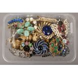 Twenty three mostly vintage costume brooches including gilt marcasite and coloured paste set