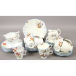 Two six part bone china tea sets, one by Anchor China Bridgwood.