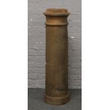 A large terracotta chimney pot H 120cm x Diameter 34cm.