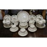 A Royal Stafford bone china 12 place tea service in the True Love design, along with a Paragon