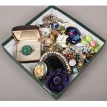 A tray of costume jewellery including Vendome boxed cocktail ring, Scottish brooch and Aynsley