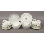 A quantity of 19th century bone china teawares with gilded decoration including slop bowls, cups and