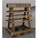 An early 20th century wooden industrial factory trolley rack, originally used in a Northampton