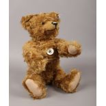 A boxed Steiff 1910 replica fully jointed teddy bear with growler, limited edition of 1910 with