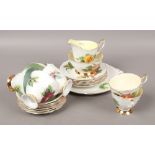 A Royal Standard bone china six place tea set in the World Famous Roses design by Harry Wheatcroft