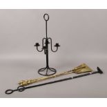 A painted metal four branch candelabra, along with brass and metal fire irons / pokers.