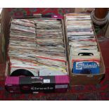 Two boxes of single records to include pop and easy listening.