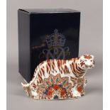 A large Royal Crown Derby paperweight, Bengal Tiger with gold stopper.