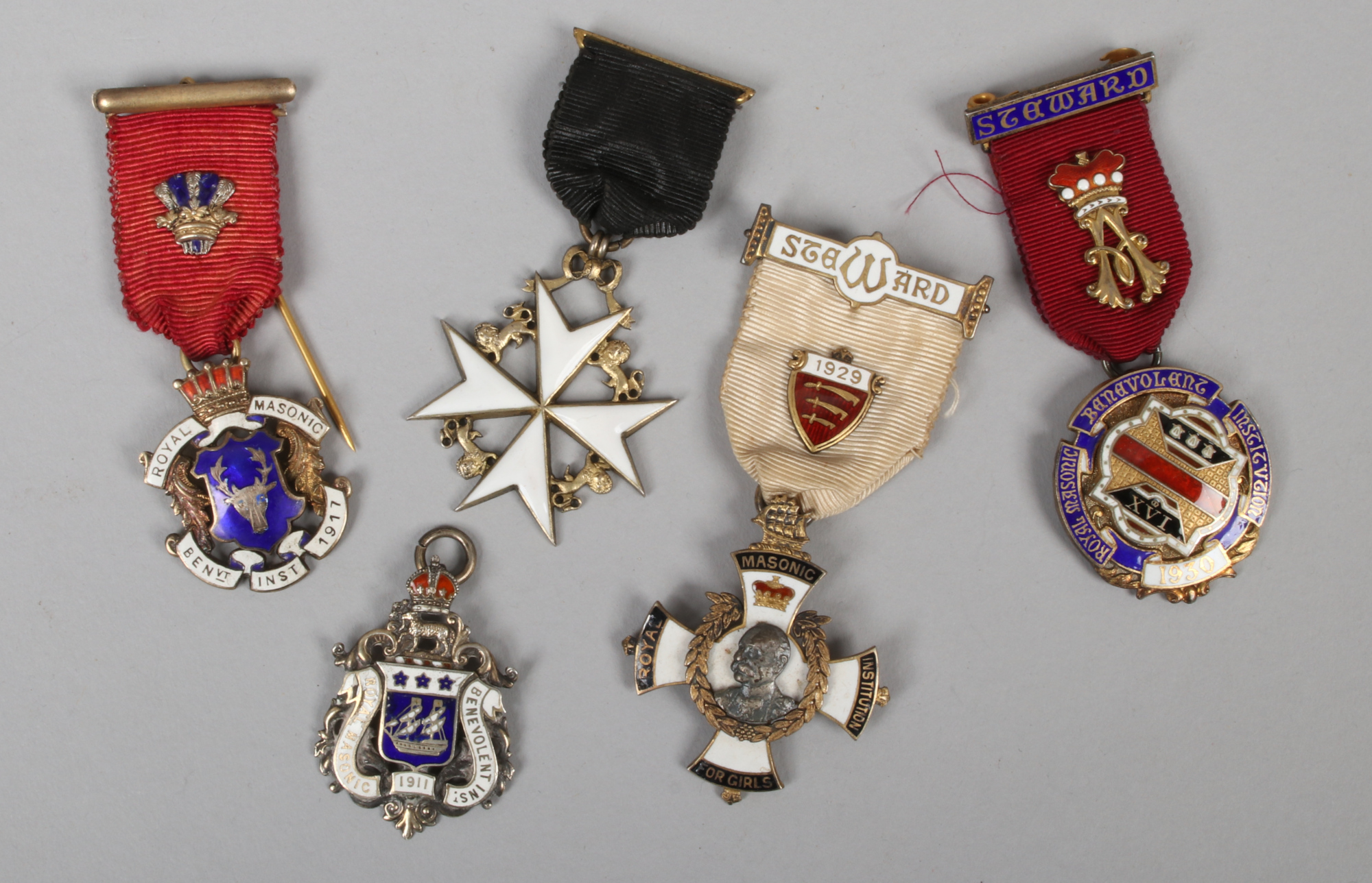 Five silver and enamel Masonic medals including four stewards jewels and a Knights of Malta jewel.