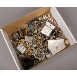 A box of various dress jewellery including gilt earrings, necklaces, beads, bangles etc.