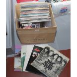 A box of L.P records to include Meatloaf, 10CC, Rod Stewart etc.