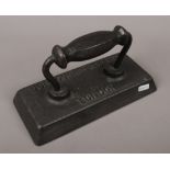 A Burroughes & Watts billiards table iron.