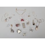 A box of silver jewellery to include earrings, pendants, money clip etc.