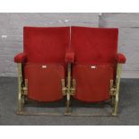 A pair of folding theatre / cinema seats.