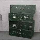 Four painted tin two door lockable deed boxes with brass knobs and carry handles.